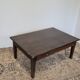 Rustic farmhouse coffee table from the 1900s with two drawers.