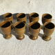 Eight vintage stoneware walking glasses