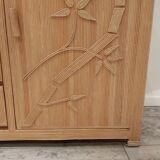 Vintage wicker sideboard with flowers
