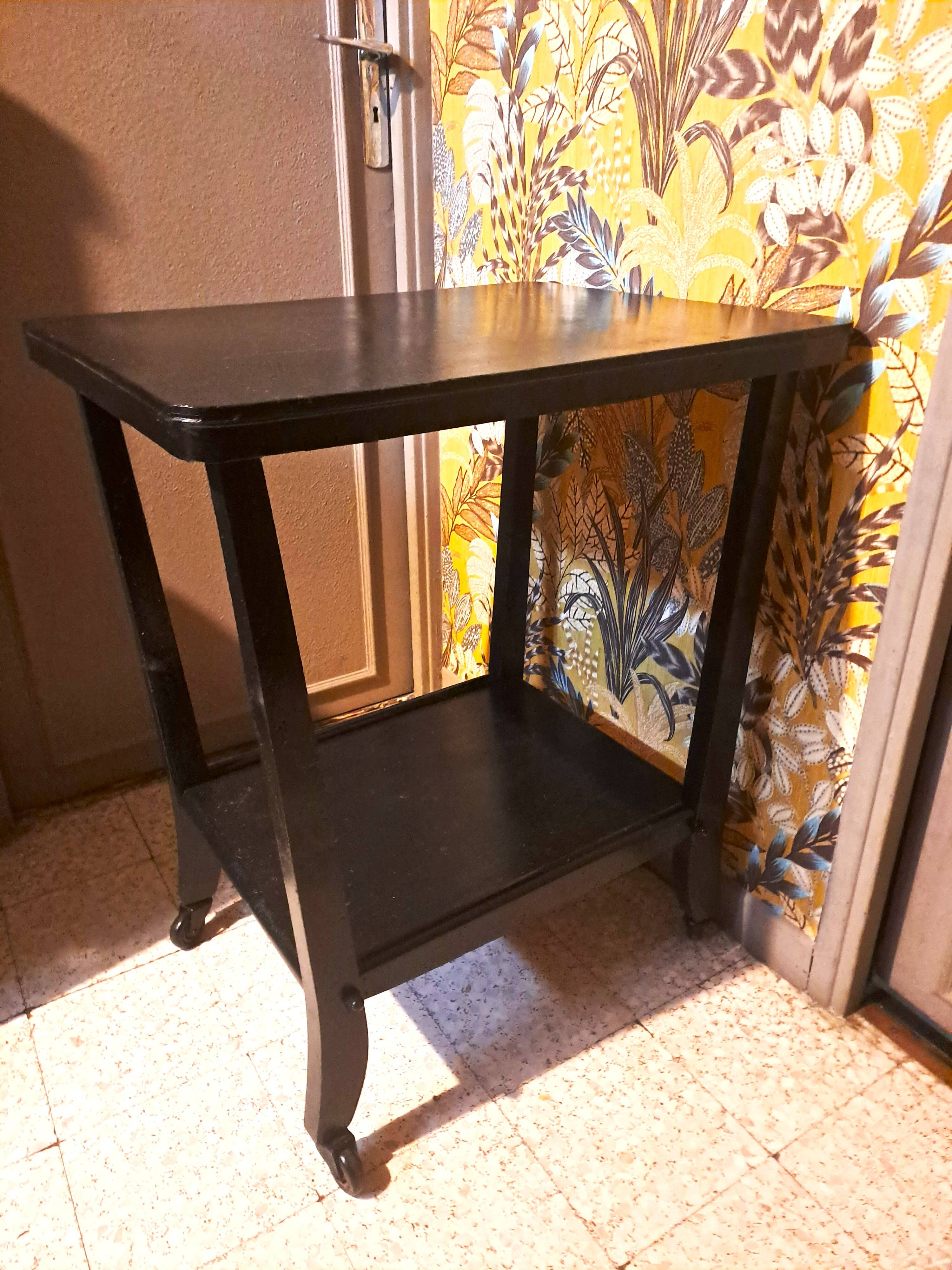 Art Deco style side table, console table on wheels, black varnished wood, 1940