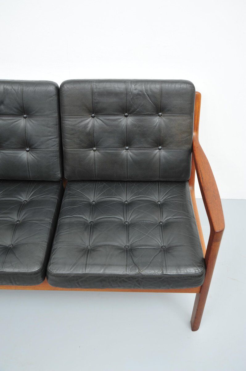 Senator sofa with black leather cushions by Ole Wascher for France and Son
