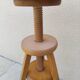 Adjustable tripod screw stool for painter artist workshop.