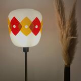 Table lamp with a vintage orange and red "Jacquard" globe in white glass and a golden base