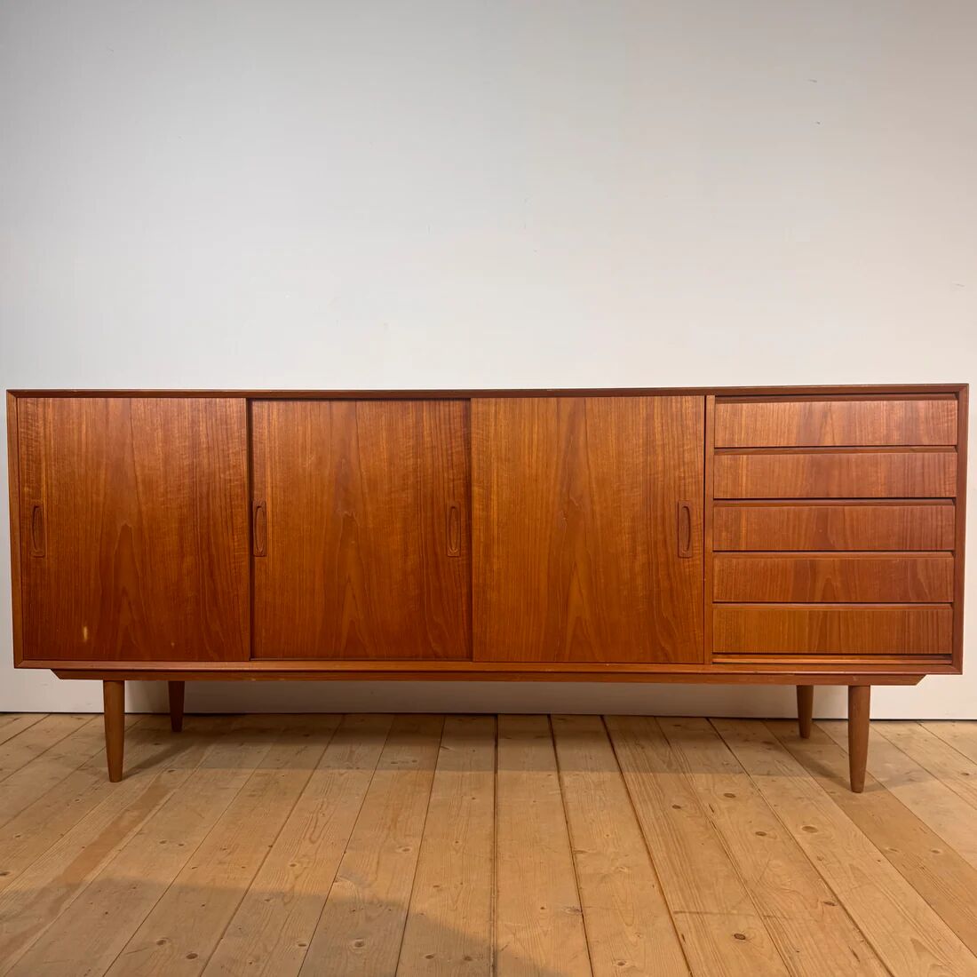 Danish teak sideboard with sliding doors and drawers, 1960s.