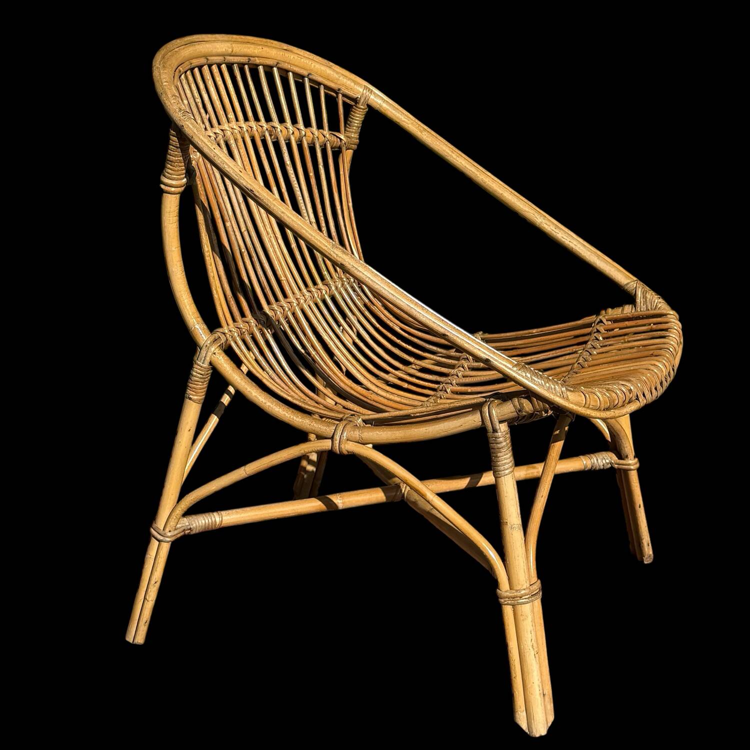 Pair of 1950s rattan armchairs from France.