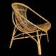 Pair of 1950s rattan armchairs from France.