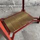 Vintage terracotta-red metal side table with glazed brown-green ceramic tile surfaces