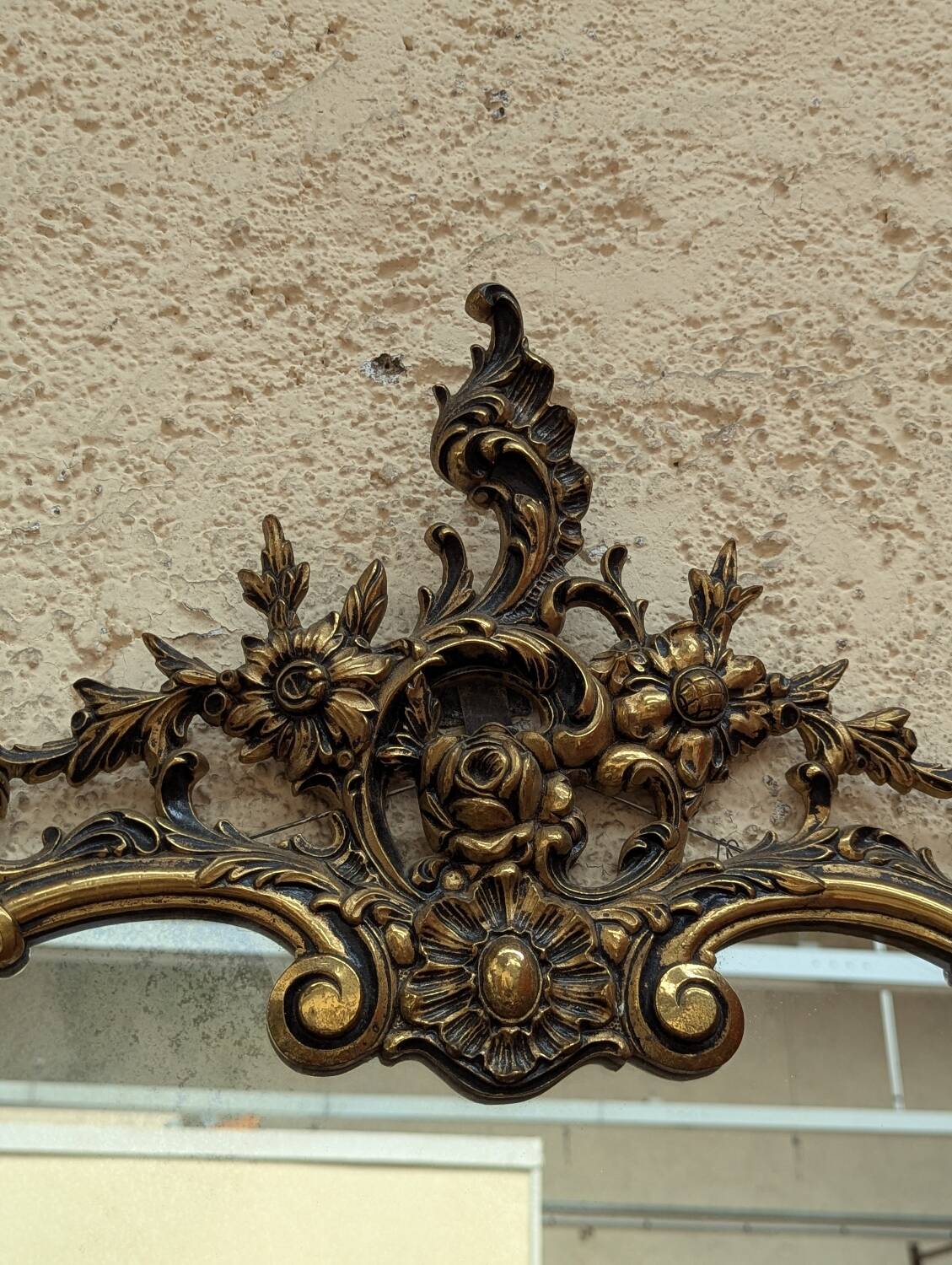 Gold metal wall mirror