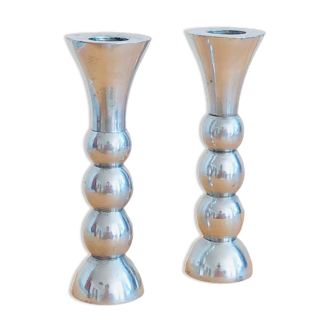 Pair of vintage cast aluminum candle holders