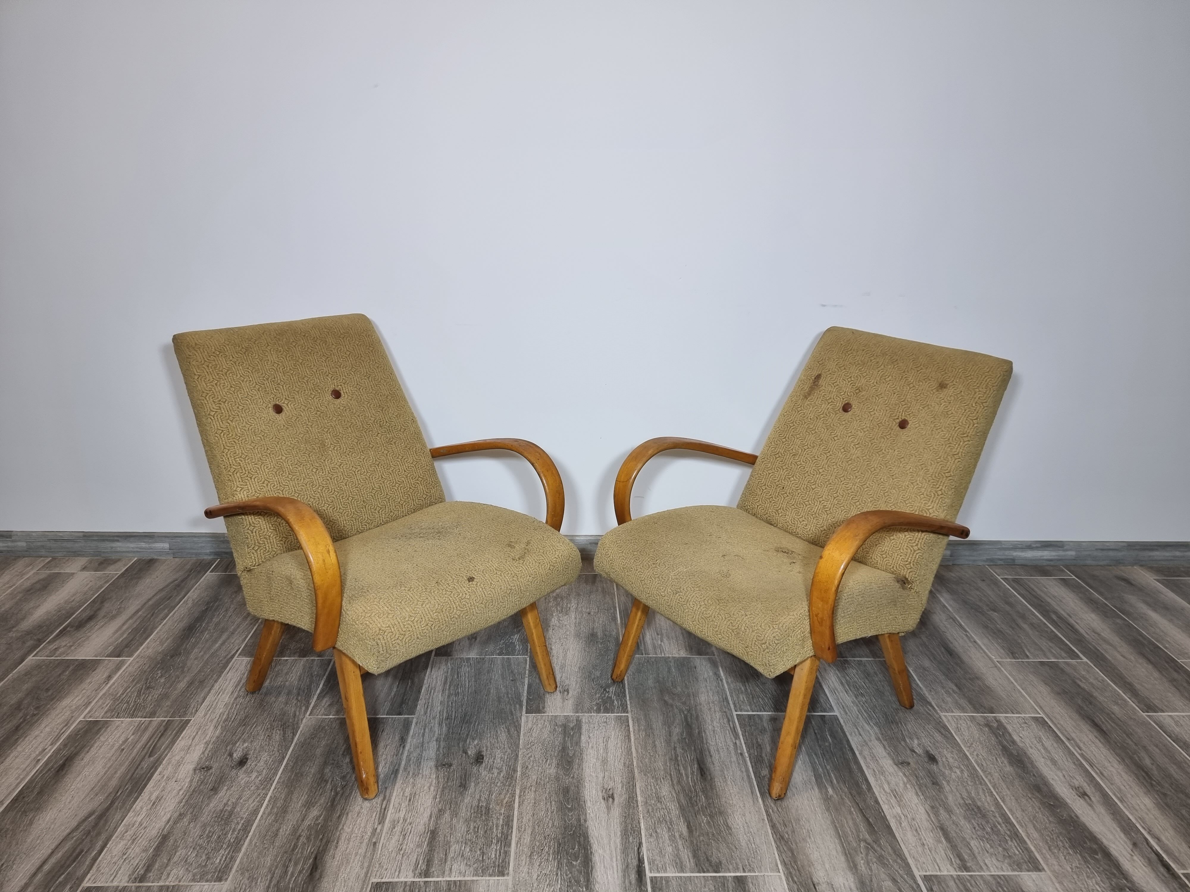 Armchairs by Jaroslav Smidek