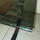 Table basse en métal chromé et verre fumé 1970