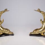 Solid brass dolphin console feet.