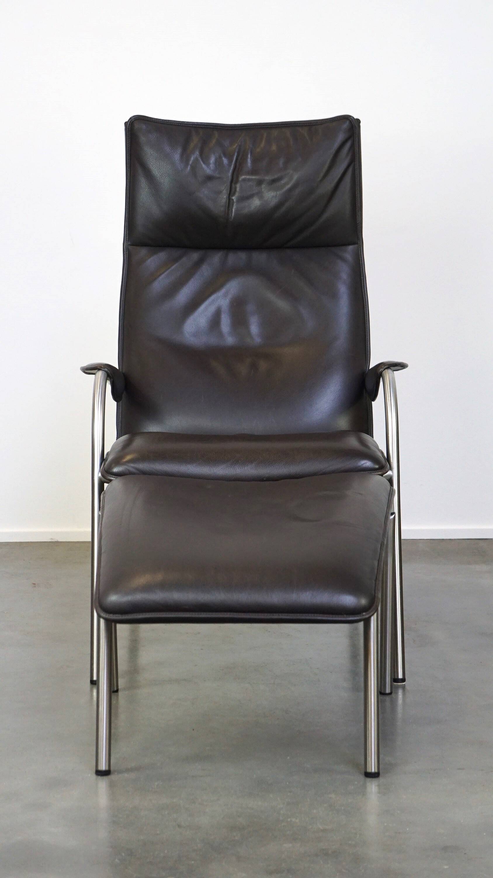 Dark brown leather design armchair + footstool De Sede DS 270