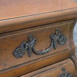 Curved Louis XV style chest of drawers known as a “tomb”