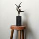 Contemporary sculpture on a marble base