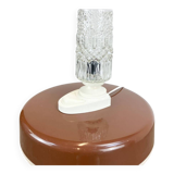 Table lamp by SAKU, glass bag on plastic base, 1970s