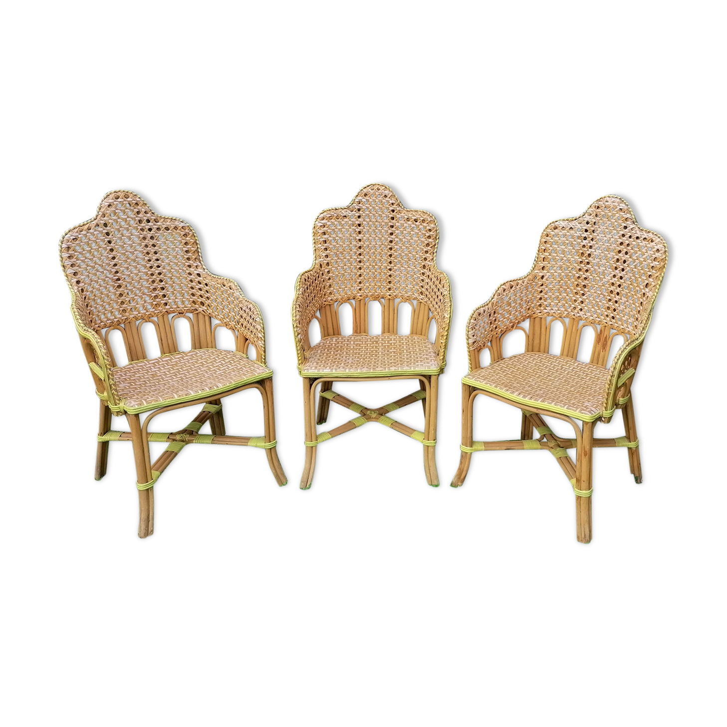 3 woven rattan armchairs