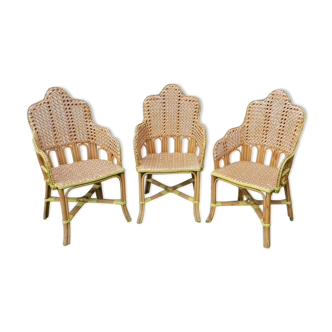 3 woven rattan armchairs