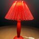 Wooden foot lamp with folded cardboard lampshade