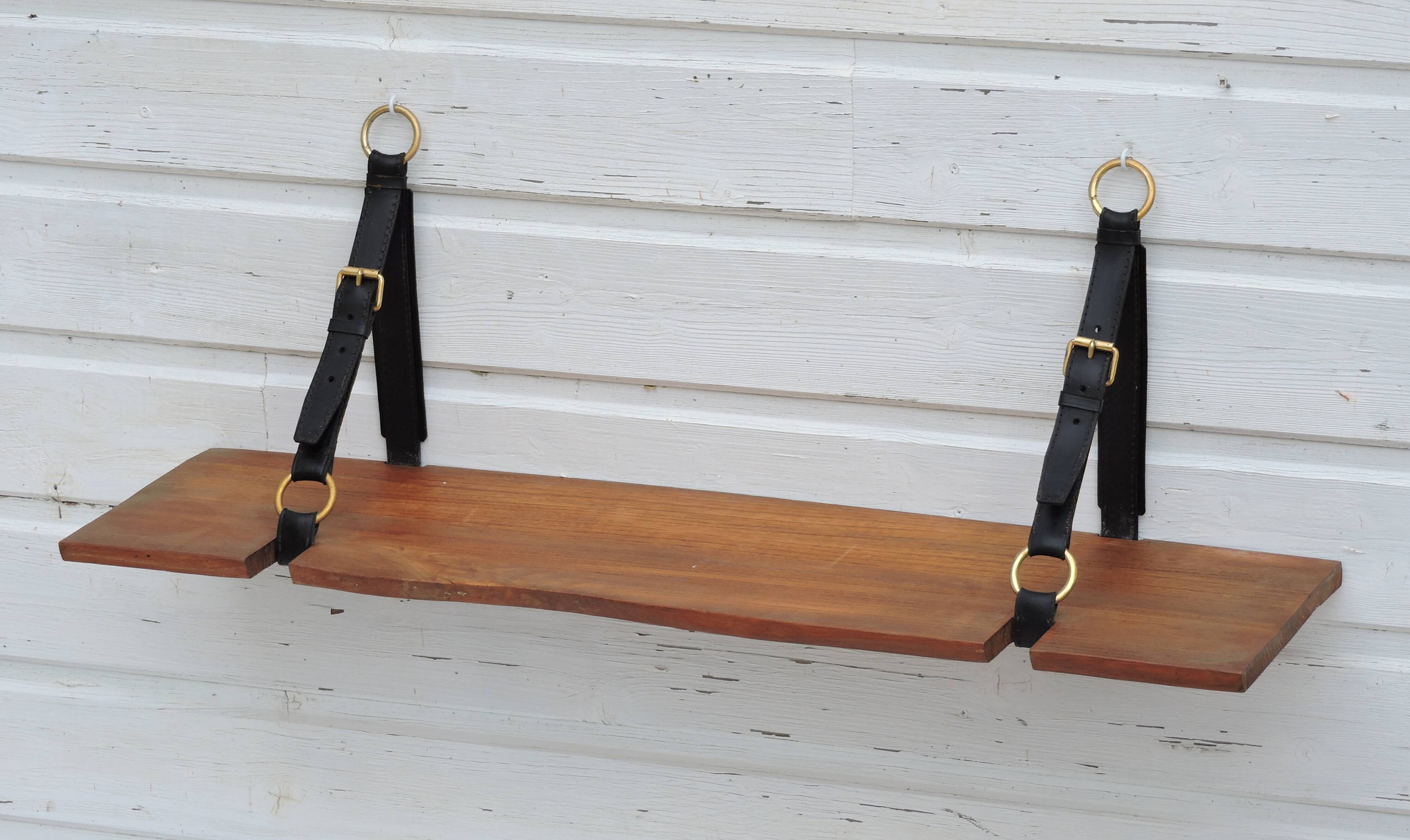 Elm and leather shelf, distributed by the Maison et Jardin Gallery in the 60