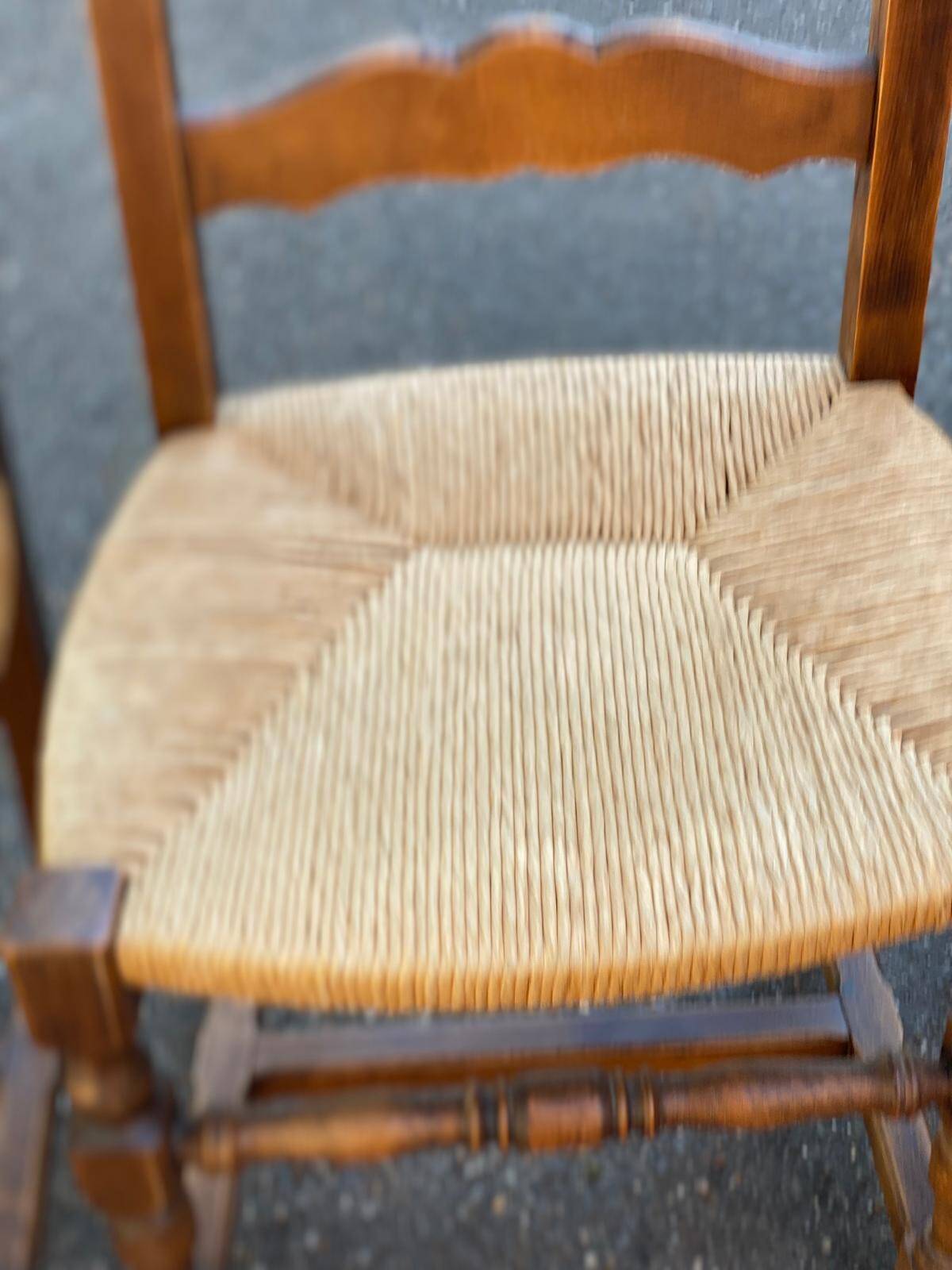 4 or 5 solid wood chairs with light oak straw and high backs
