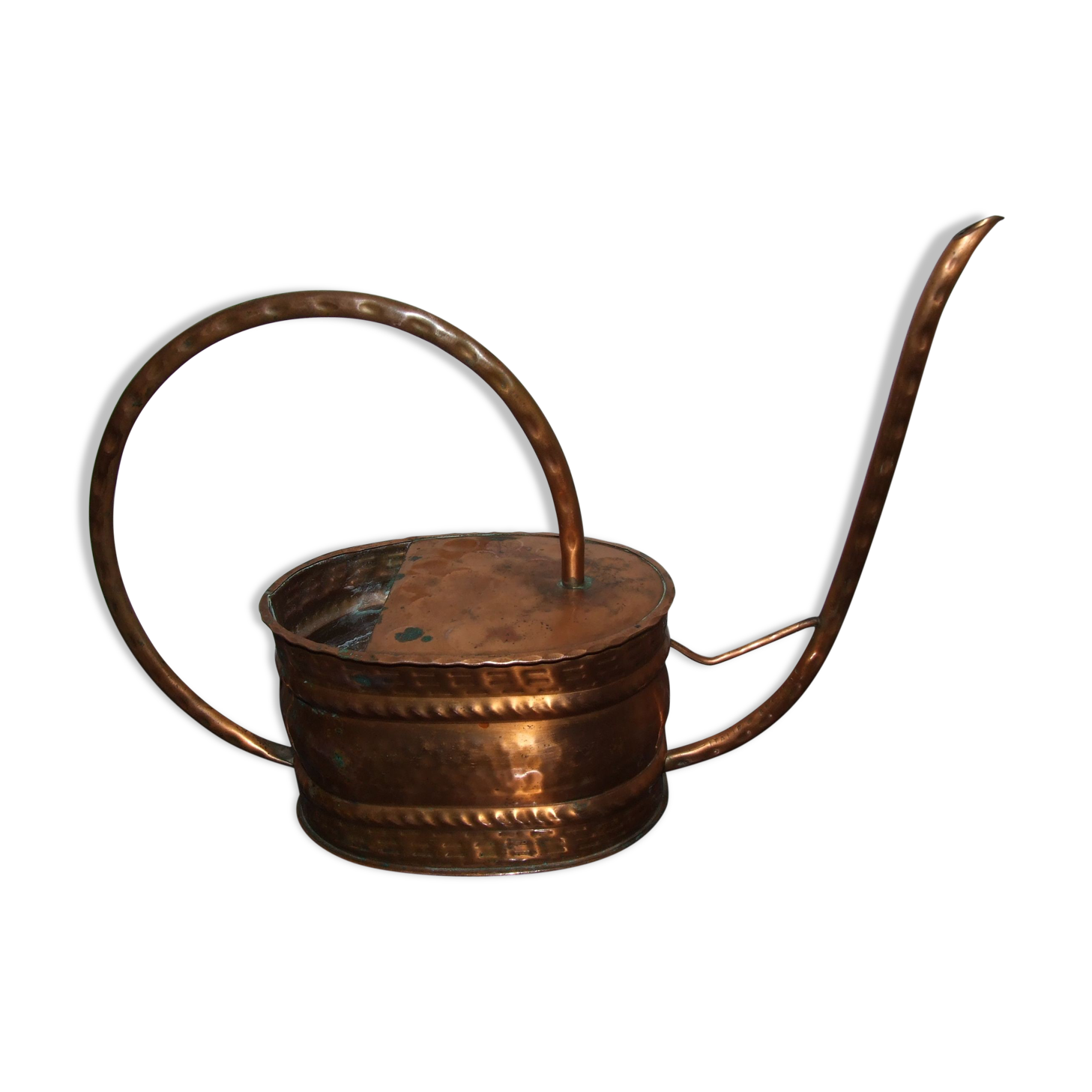 Old copper watering can