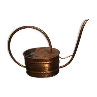 Old copper watering can