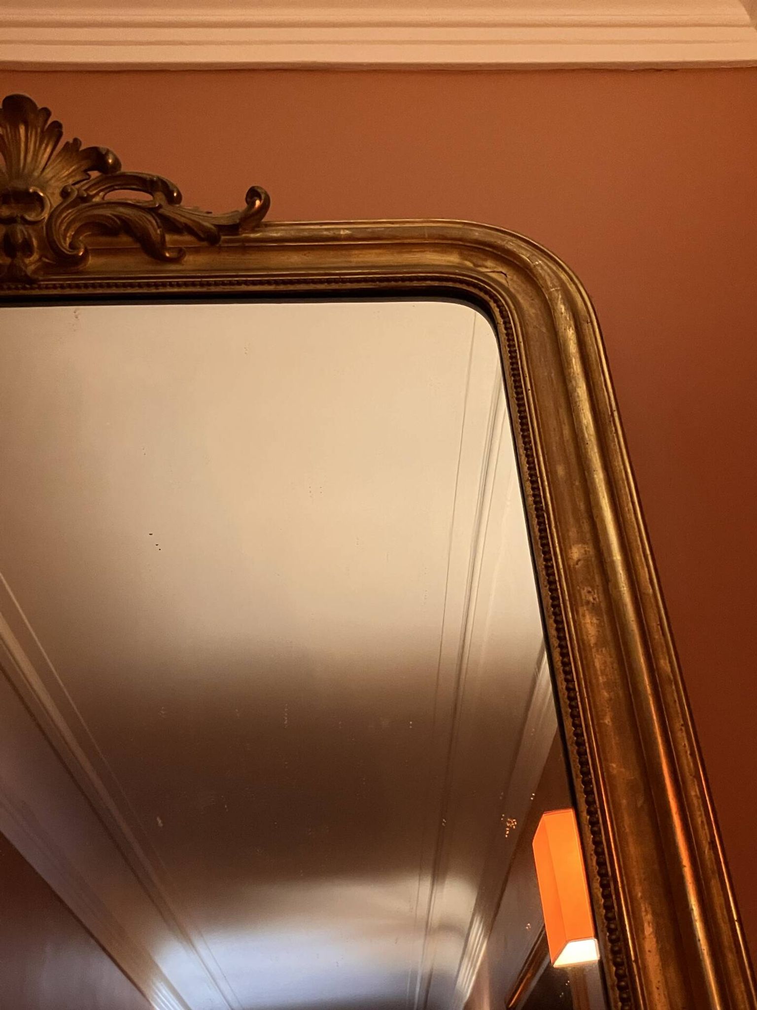 Antique gilded wooden mirror