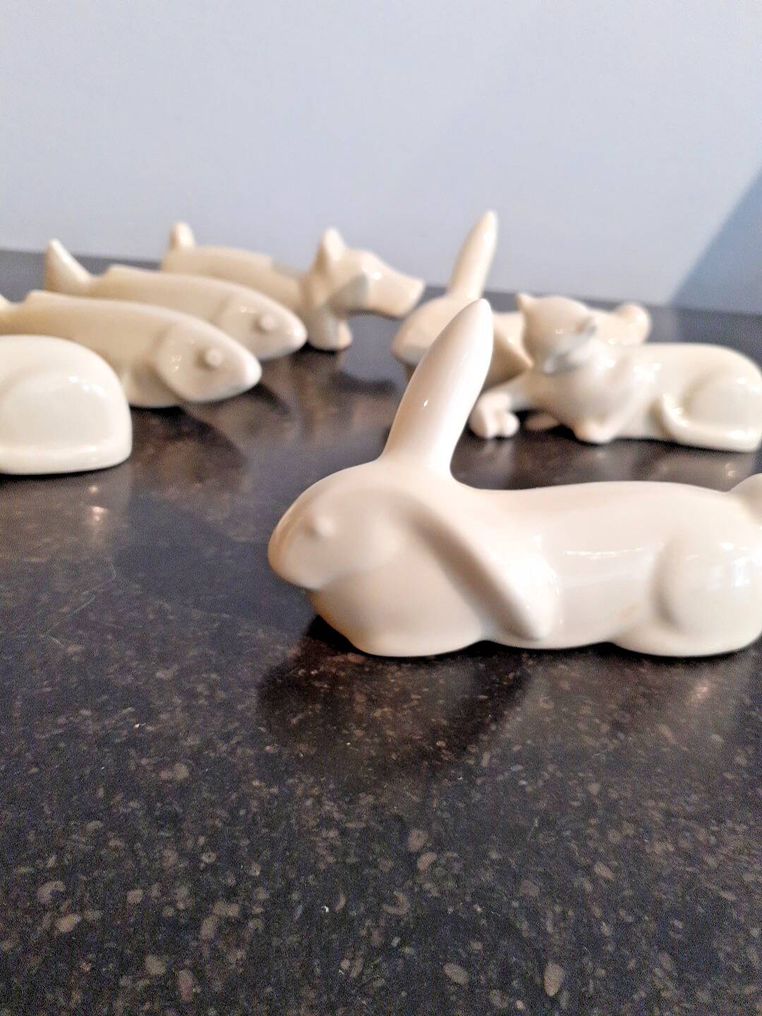 Set of 7 porcelain knife rests, animals, dog, cats, fish, rabbit.