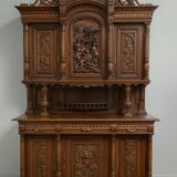 Important two-body buffet in solid walnut, richly carved in pure Renaissance style.