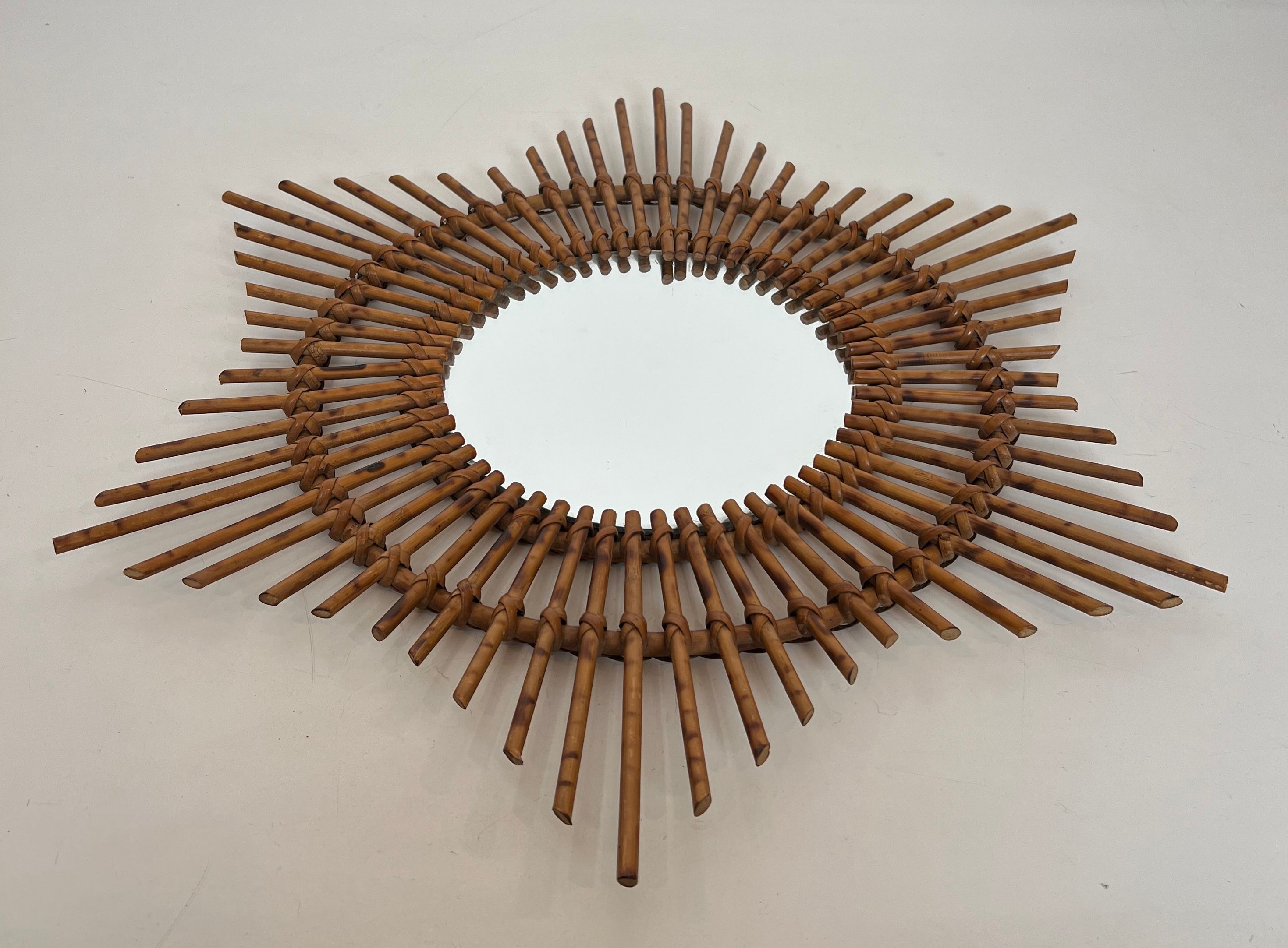 Rattan mirror in the shape of a star.