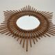 Rattan mirror in the shape of a star.