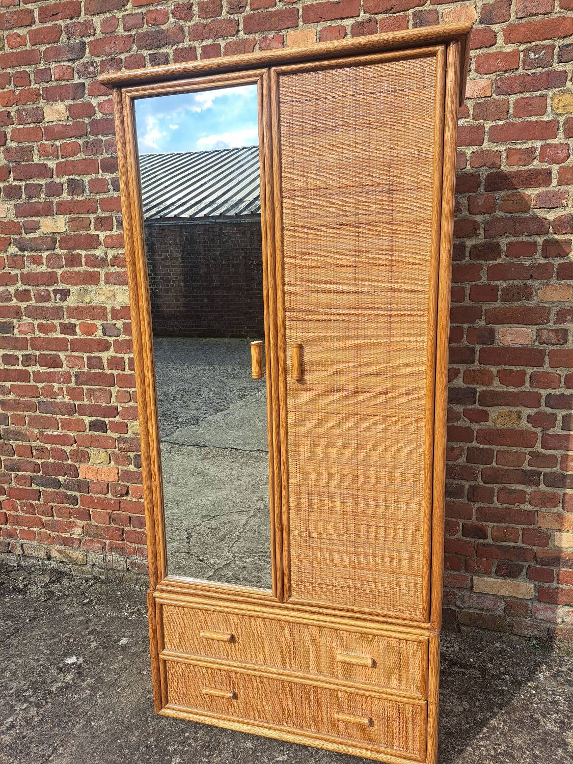 Large rattan wardrobe with mirror