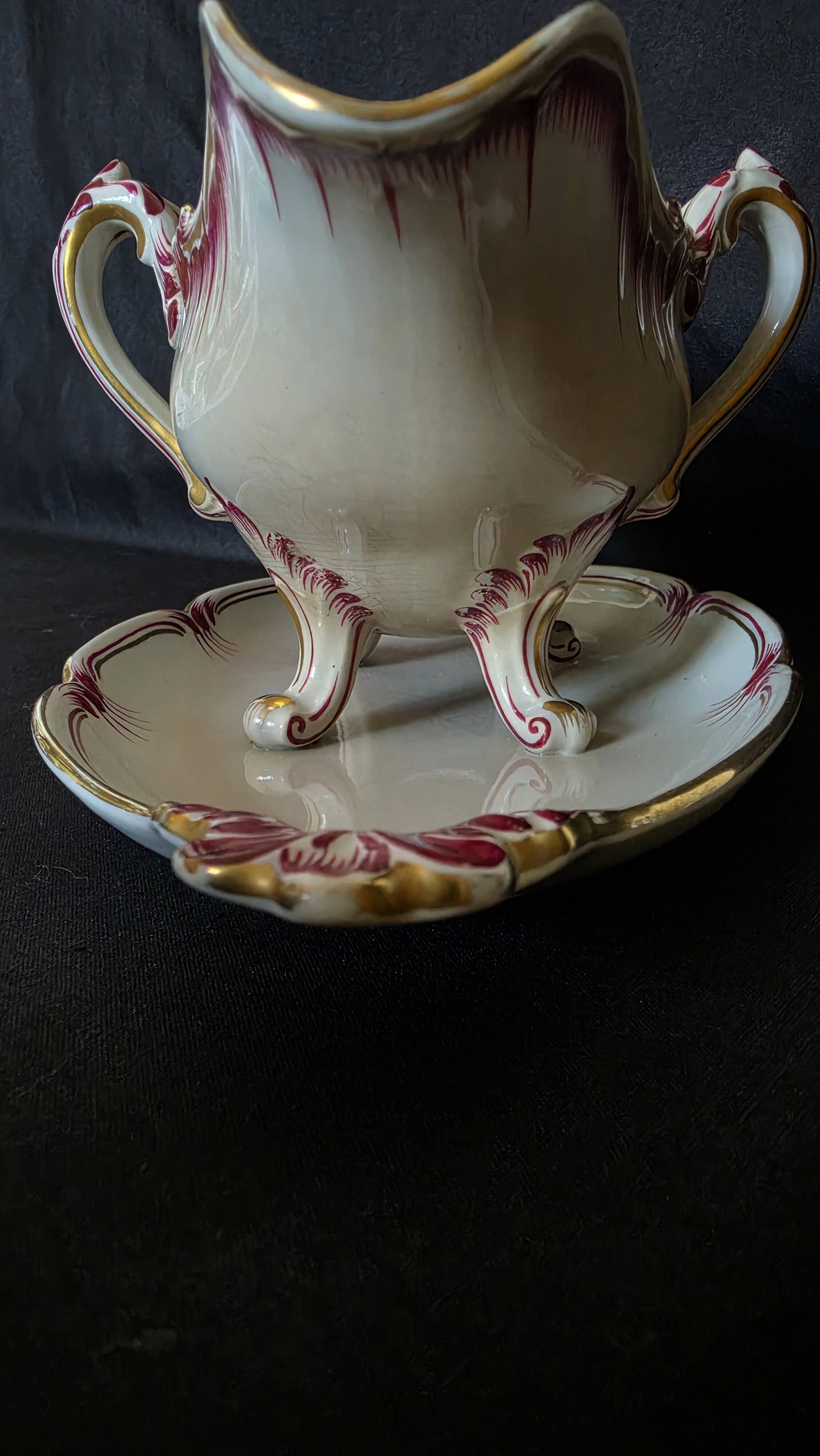 Antique sauce boat in fine earthenware from Sarreguemines, France, neo style.