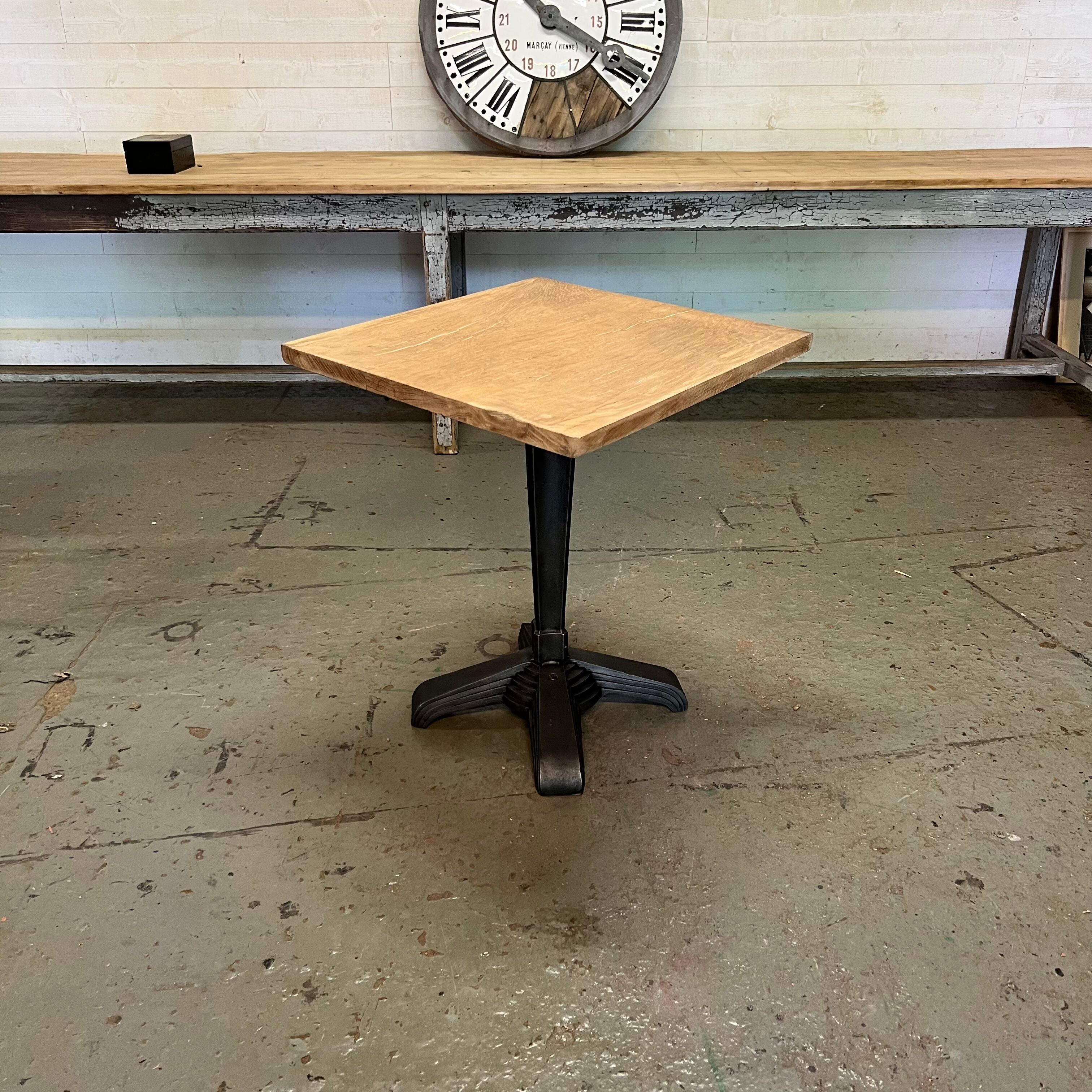 Old cast iron pedestal table brand LV