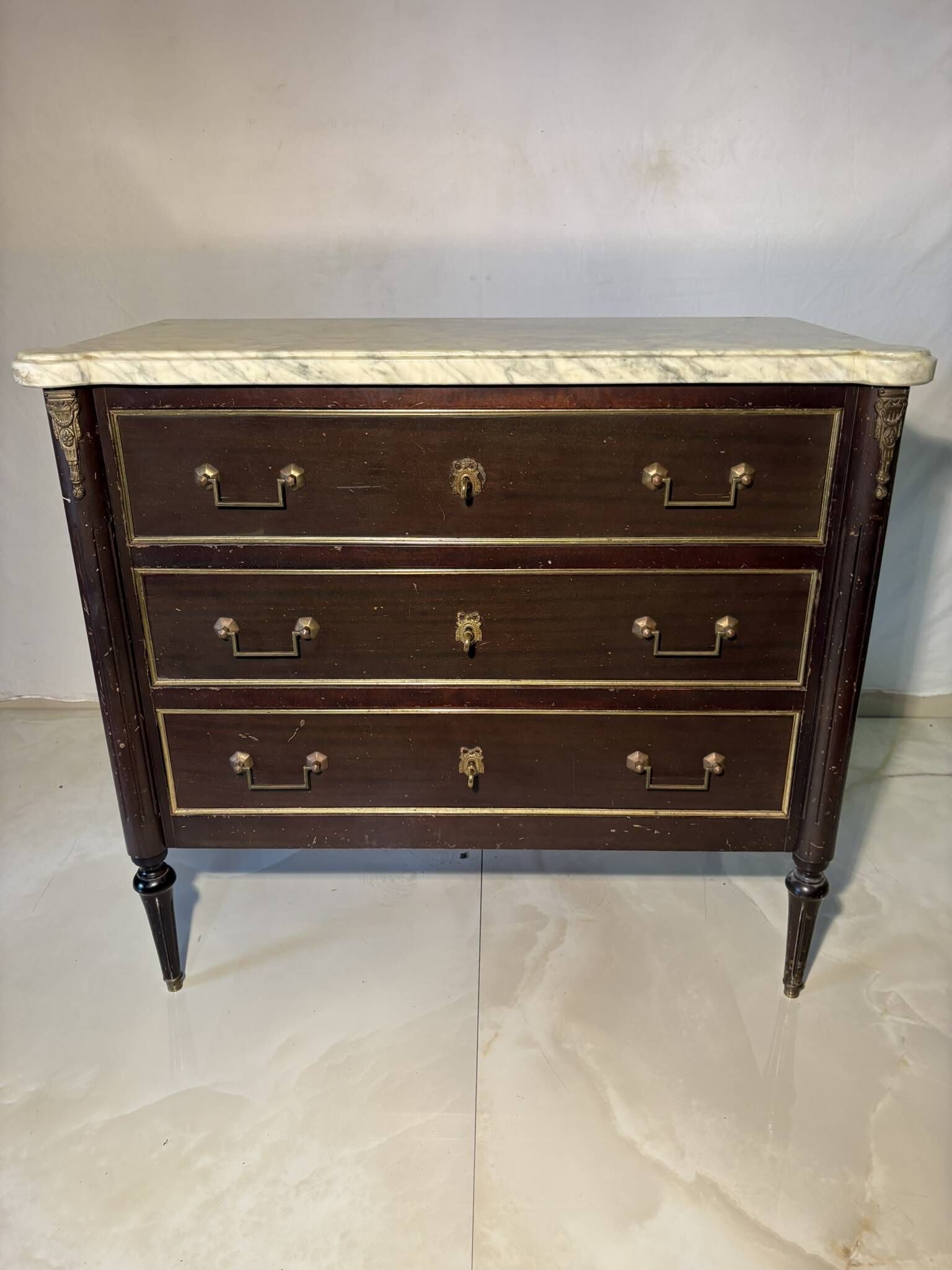 Commode with 3 drawers in Louis XVI style, marble and gilded bronze.