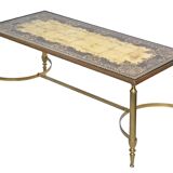 Coffee table in gilded brass