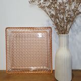 Plat en verre rosé