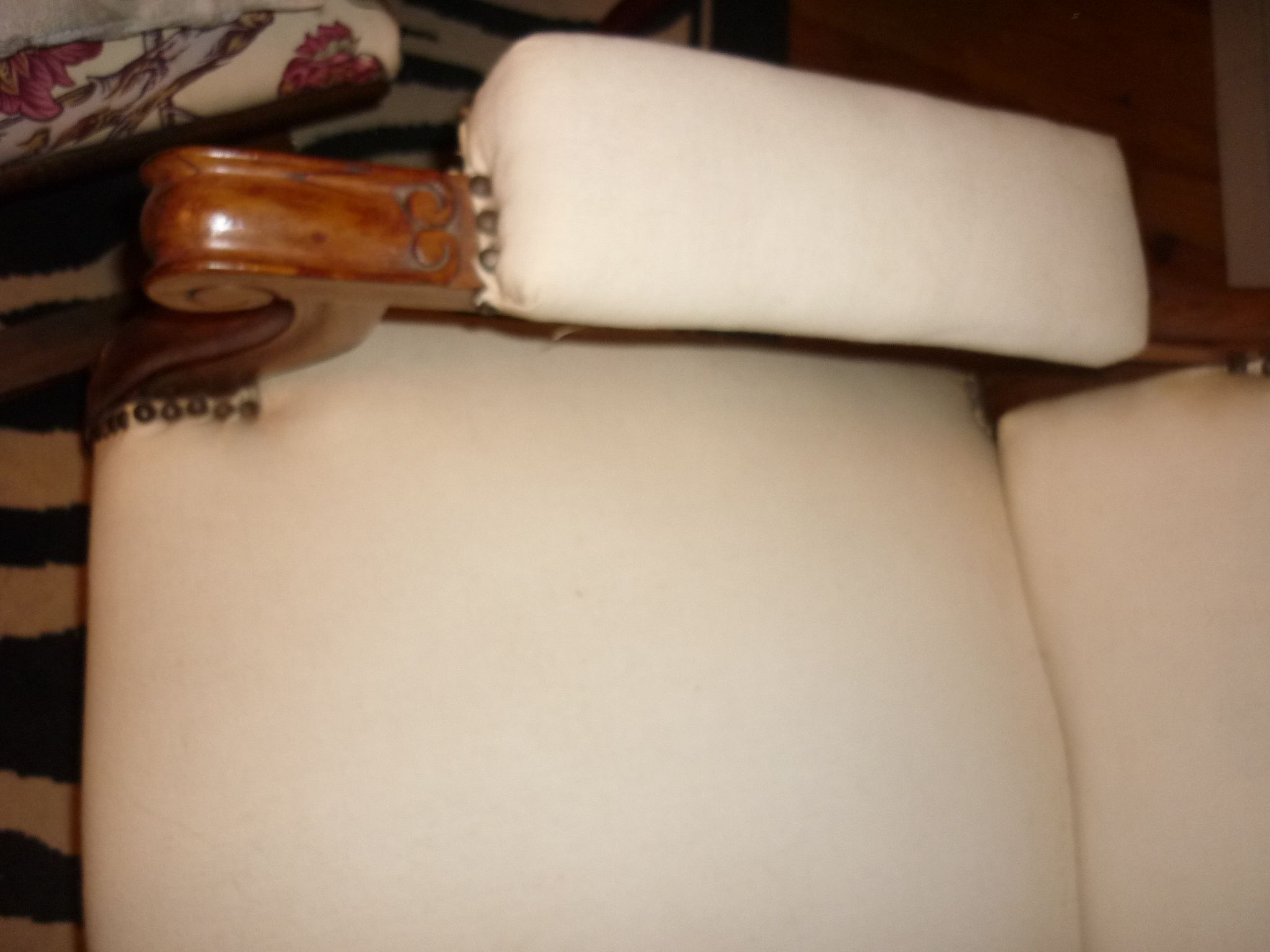 Armchair and its footrest