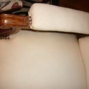 Armchair and its footrest