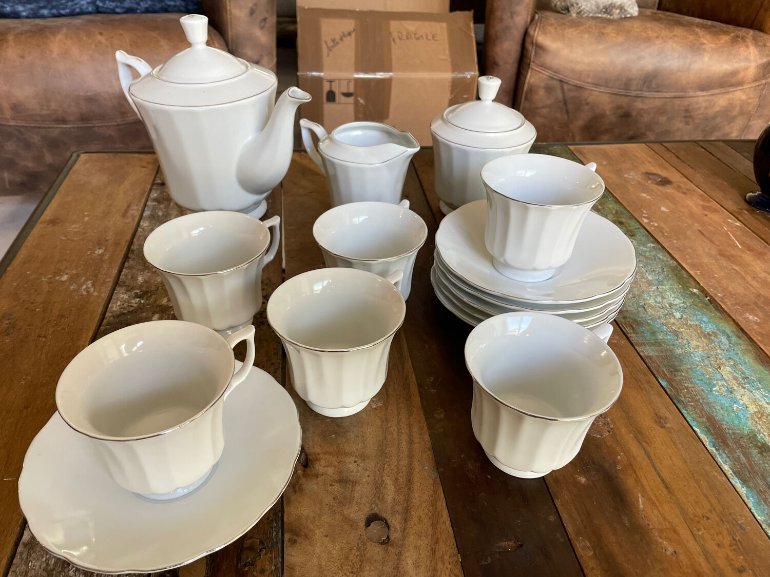 Coffee service for 6 cups, coffee pot, sugar bowl, and milk jug.