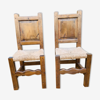 Pair of wooden and straw chairs