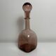 Bottle decanter in bubbled blown purple glass glassware from Biot