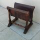 Vintage magazine rack in oak and antique leather