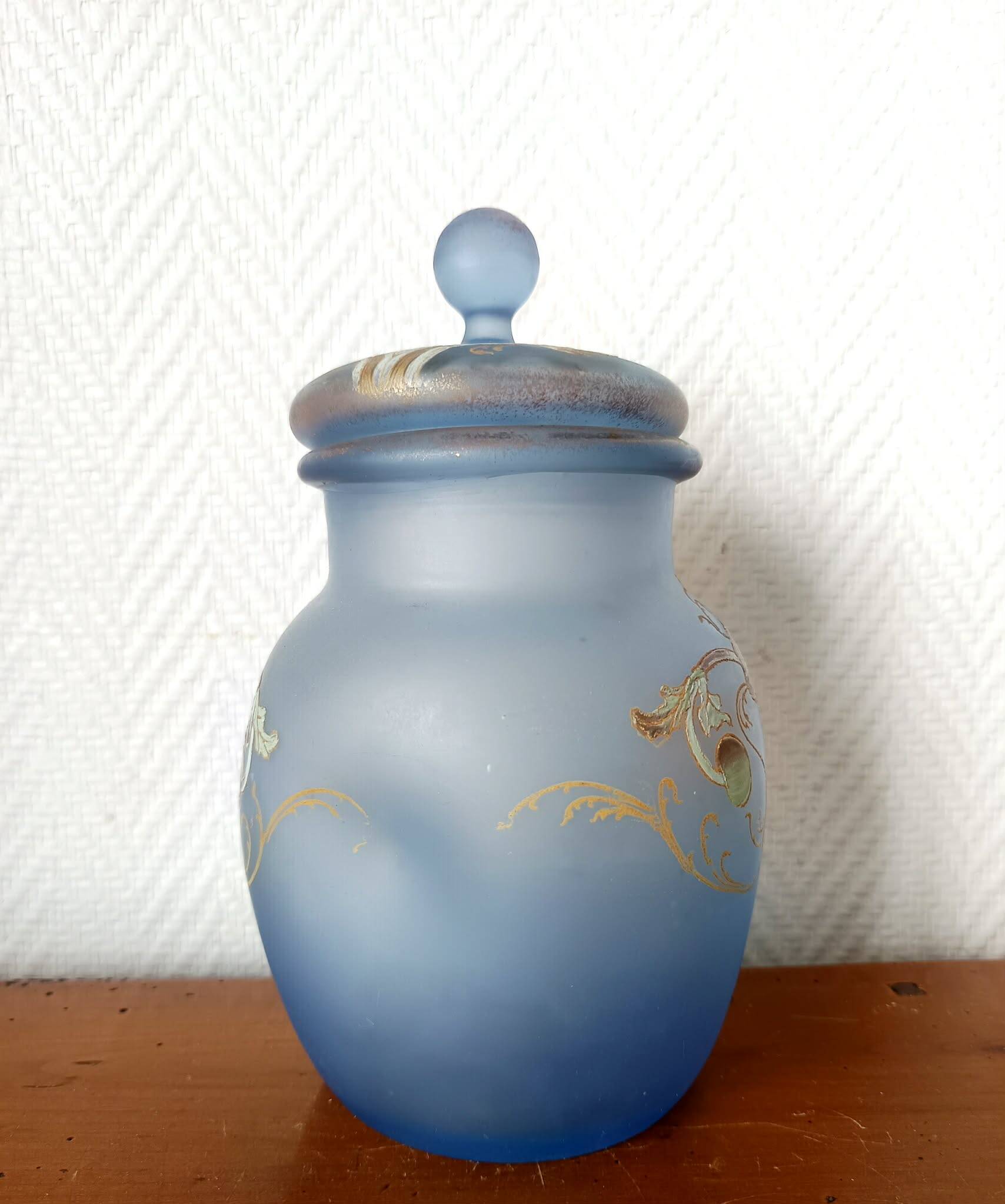 Art Nouveau covered vase with anemones