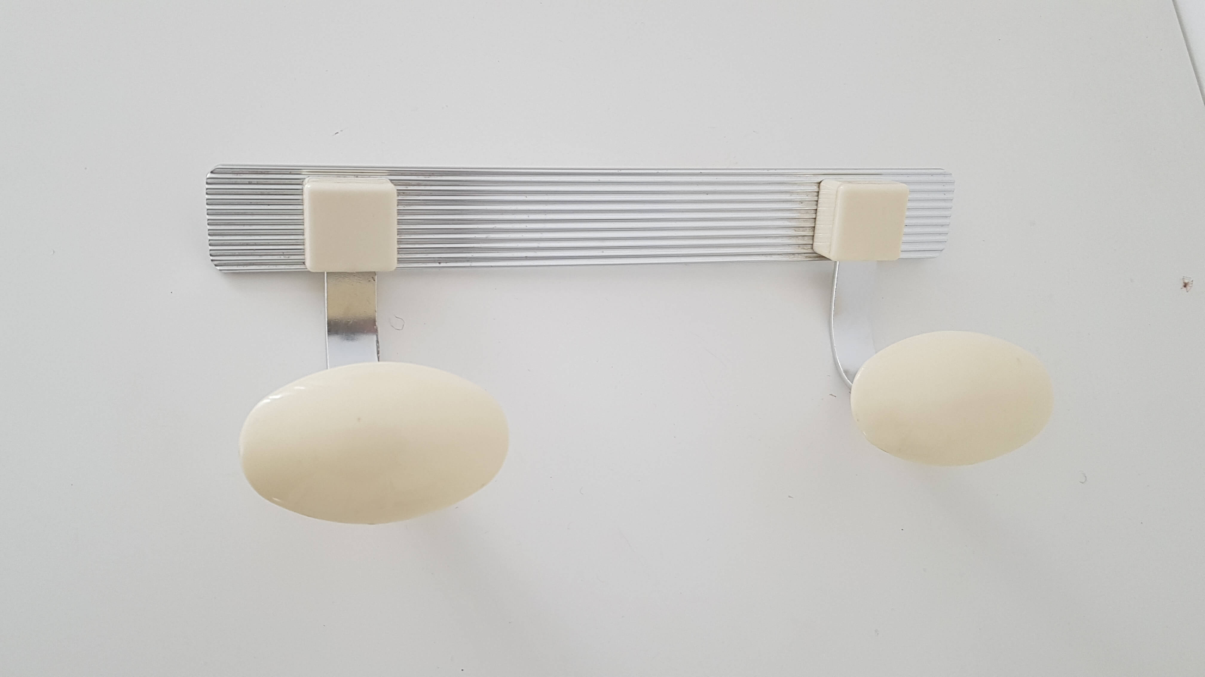 Metal coat rack and bakelite - seventies