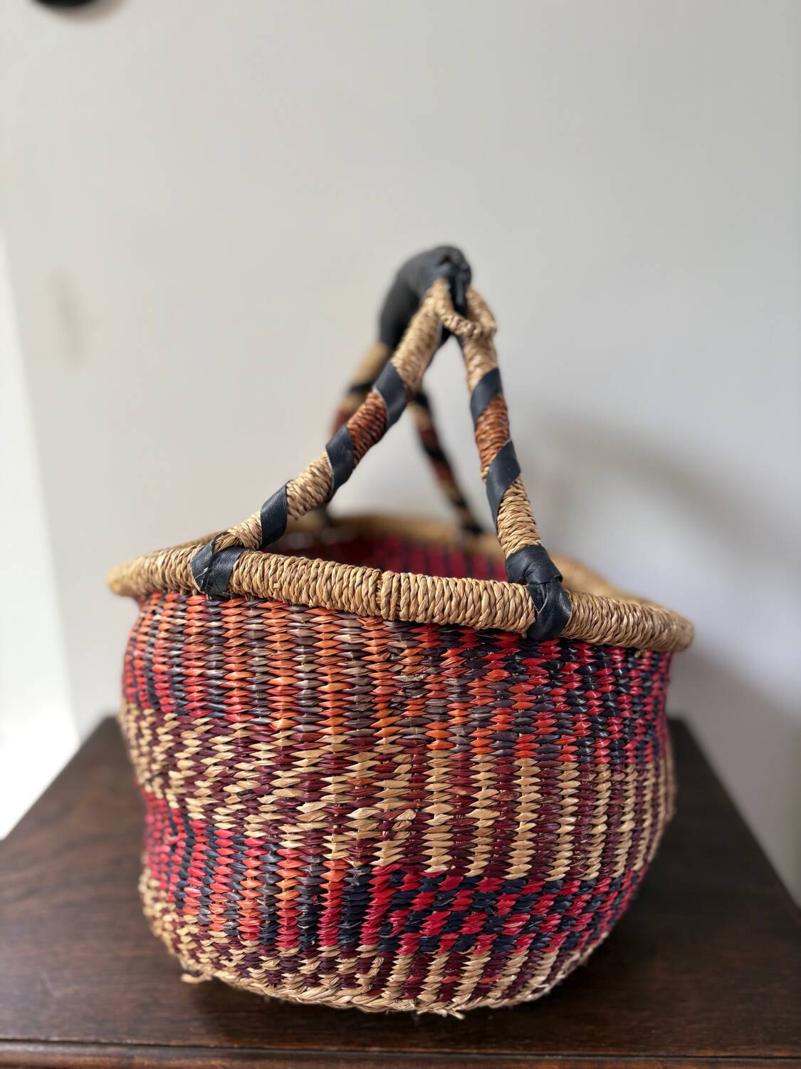 Vintage colorful woven rush ethnic basket