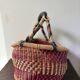 Vintage colorful woven rush ethnic basket