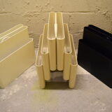 Kartell magazine holder by Giotto Stoppino