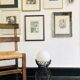 Handcrafted wrought iron lamp with a white opaline globe.